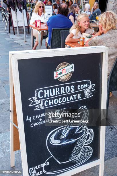 Valencia, typical breakfast churros con chocolate, blackboard sign.
