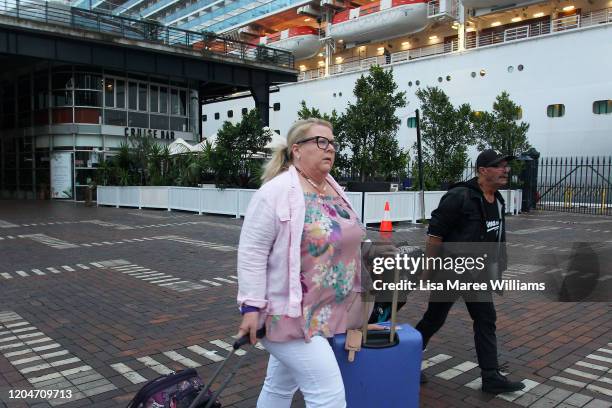 Passengers disembark from the Ruby Princess at Overseas Passenger Terminal on February 08, 2020 in Sydney, Australia. Authorities around the world...