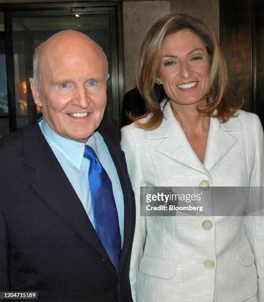 Jack Welch, former chairman and chief executive officer of General Electric Co., and his wife Suzy Welch, arrive for a cocktail party in New York,...