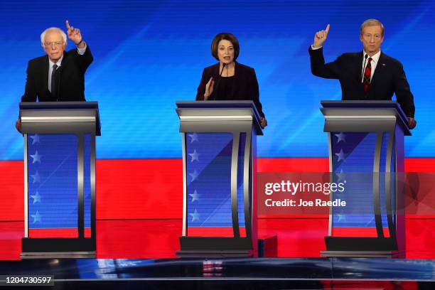 Democratic presidential candidates Sen. Bernie Sanders , Sen. Amy Klobuchar and Tom Steyer participate in the Democratic presidential primary debate...