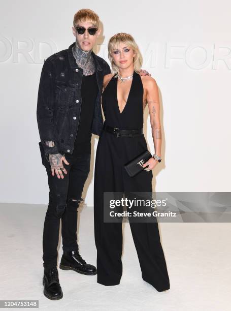 Trace Cyrus and Miley Cyrus arrives at the Tom Ford AW20 Show at Milk Studios on February 07, 2020 in Hollywood, California.