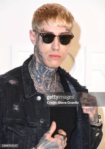 Trace Cyrus arrives at the Tom Ford AW20 Show at Milk Studios on February 07, 2020 in Hollywood, California.