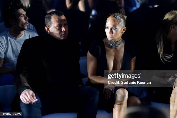 Alex Rodriguez and Jennifer Lopez attend Tom Ford: Autumn/Winter 2020 Runway Show at Milk Studios on February 07, 2020 in Los Angeles, California.