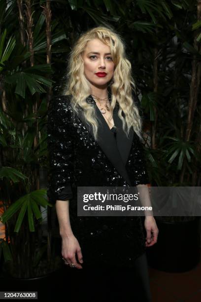 Amber Heard attends Vanity Fair and Saint Laurent Celebrate "Parasite" on February 07, 2020 in Los Angeles, California.