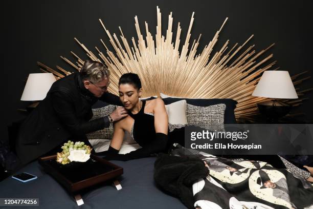 Montgomery Frazier and model at the LA Launch Event Of SohoMuse at Christopher Guy West Hollywood Showroom on February 07, 2020 in West Hollywood,...