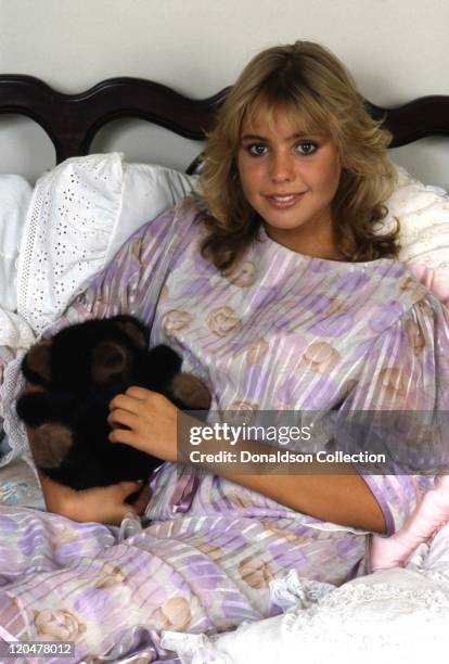 English actress and musician Olivia D'Abo poses for a portrait at home in 1995 in Los Angeles, California.
