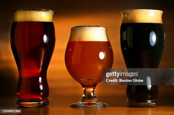 Beers on tap at the Samuel Adams Tap Room in Boston, from left, Brick Red, Mango Guava, and Oaked Vanilla Porter are pictured on Feb. 25, 2020.