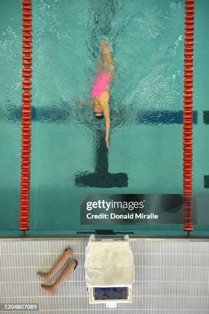 Aerial view of Jessica Long in action during practice session photo shoot at US Olympic Training Center. View of her prosthetic legs outside of the...