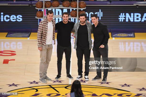 Pittsburgh Penguins players Evgeni Malkin, Conor Sheary, Kris Letang, and Sidney Crosby pose for a photo before the game between the Los Angeles...