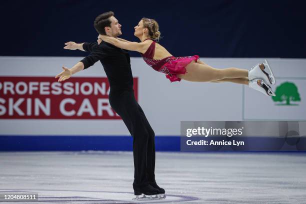 Kristen Moore-Towers and Michael Marinaro of Canada perform in the Pairs Free Skating during day 3 of the ISU Four Continents Figure Skating...