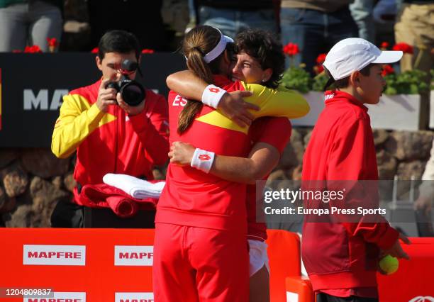 Carla Suarez of Spain celebrates the victory against Kurumi Nara of Japan with Anabel Medina during the Fed Cup, group round, played between Spain...