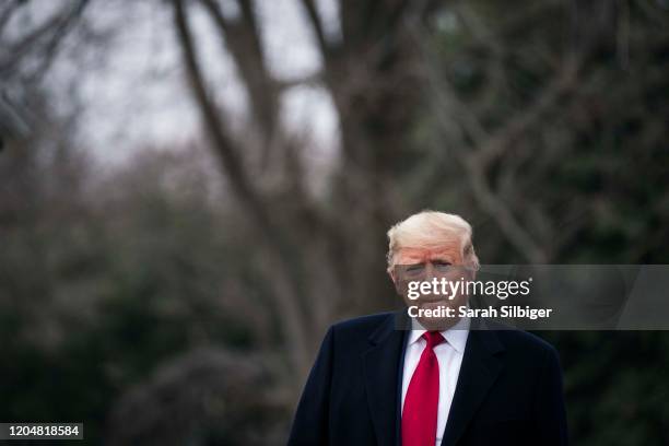 President Donald Trump walks along the South Lawn as he departs from the White House on March 2, 2020 in Washington, DC. President Trump is scheduled...