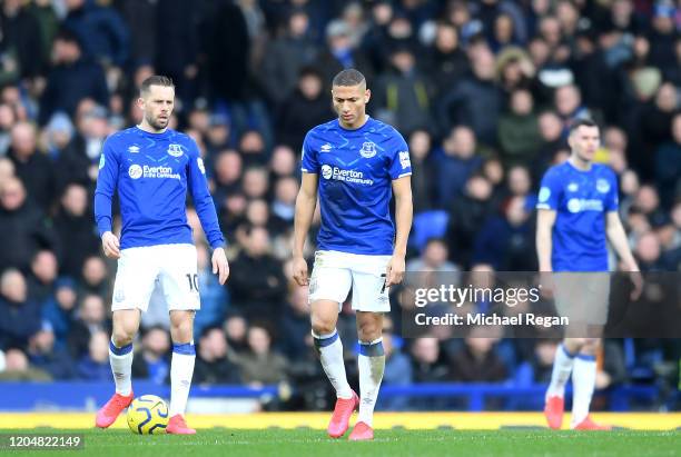 Gylfi Sigurdsson and Richarlison of Everton look dejected after conceding their sides first goal during the Premier League match between Everton FC...