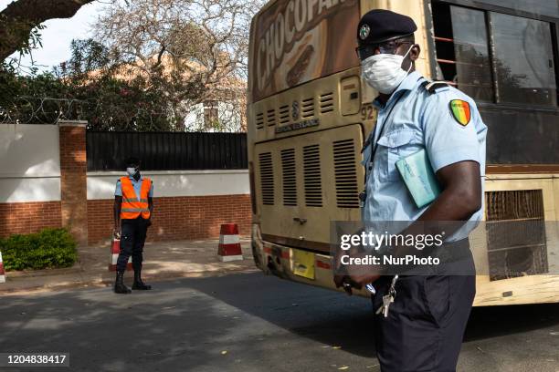 Police man wearing a face mask in Dakar, Senegal, on March 3, 2020. Afrench person coming by a plane with Air Senegal arrived saturday 29 th of...