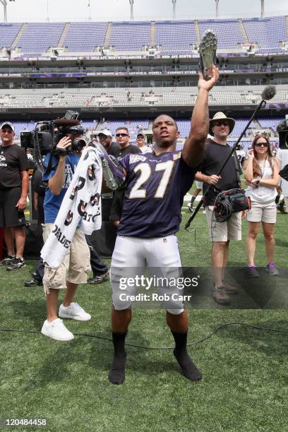 Ray Rice of the Baltimore Ravens throws his shoe into the stands following training camp at M&T Bank Stadium on August 6, 2011 in Baltimore, Maryland.