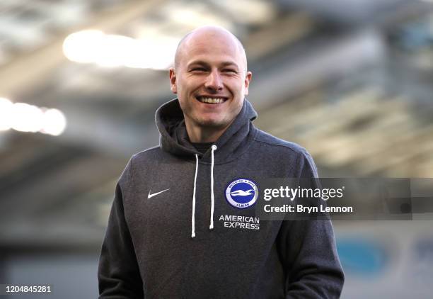 Aaron Mooy of Brighton and Hove Albion looks on during a pitch inspection prior to the Premier League match between Brighton & Hove Albion and...