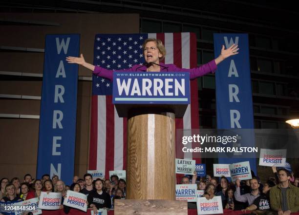 Democratic White House hopeful Massachusetts Senator Elizabeth Warren speaks to her supporters during a campaign rally on the eve of the California...