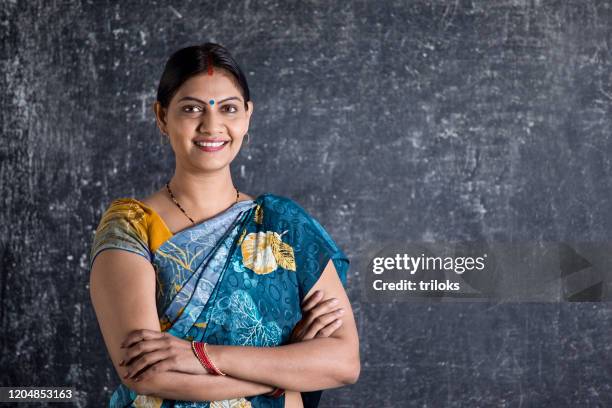 teacher in front of blackboard - india sari stock pictures, royalty-free photos & images