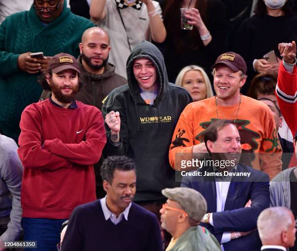 Josh Safdie, Pete Davidson and Sebastian Bear-McClard attend Houston Rockets v New York Knicks game at Madison Square Garden on March 2, 2020 in New...