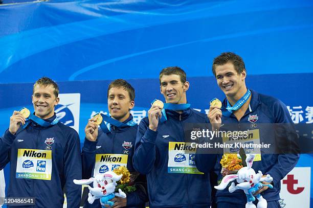 14th FINA World Championships: Team USA Nicholas Thoman, Mark Gangloff, Michael Phelps, and Nathan Adrian victorious with gold medal after winning...