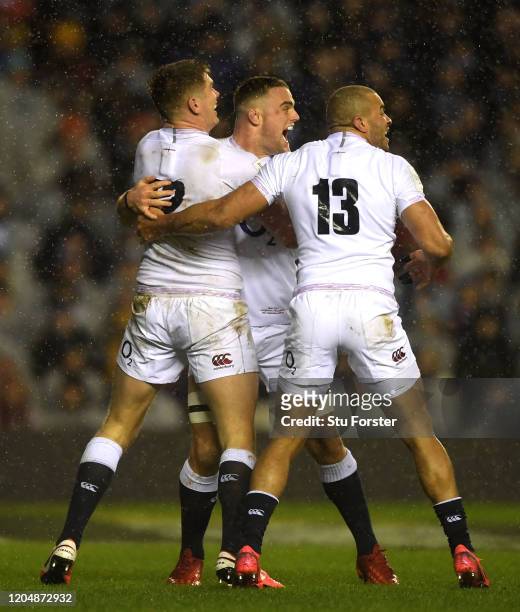 Players of England celebrate after Ellis Genge of England touches down for his team's first try during the 2020 Guinness Six Nations match between...