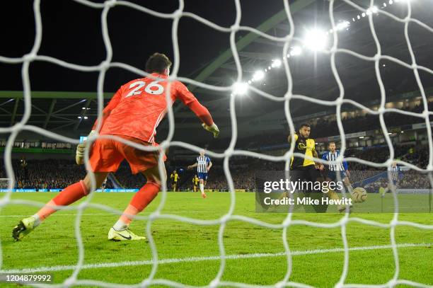 Adrian Mariappa of Watford scores an own goal during the Premier League match between Brighton & Hove Albion and Watford FC at American Express...