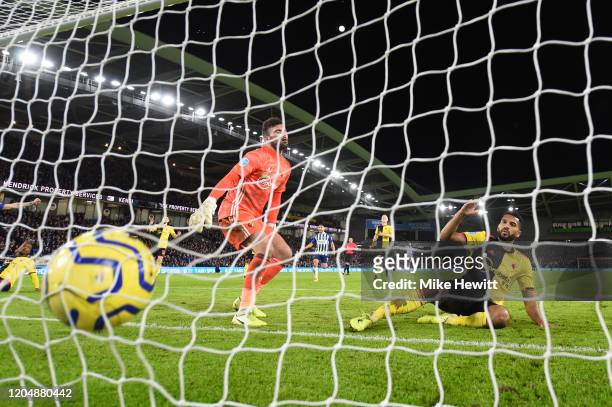 Adrian Mariappa of Watford scores an own goal during the Premier League match between Brighton & Hove Albion and Watford FC at American Express...