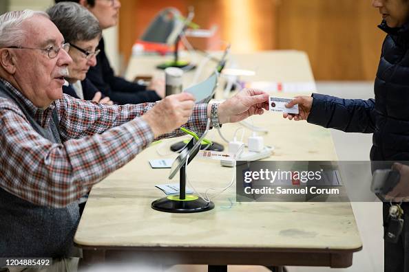 Voters In 14 States Head To The Polls On Super Tuesday Voters In 14 States Head To The Polls On Super Tuesday