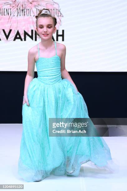 Model walks the runway wearing Marie Belle Couture during NYFW Powered By hiTechMODA on February 08, 2020 in New York City.