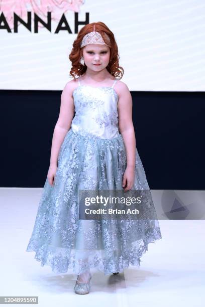 Model walks the runway wearing Marie Belle Couture during NYFW Powered By hiTechMODA on February 08, 2020 in New York City.