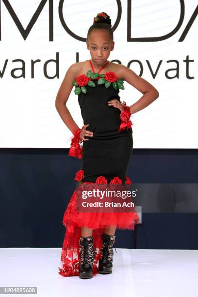 Model walks the runway wearing Glam2Glo Designz during NYFW Powered By hiTechMODA on February 08, 2020 in New York City.