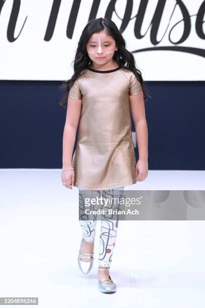 Model walks the runway wearing Rock 'n' Mouse during NYFW Powered By hiTechMODA on February 08, 2020 in New York City.
