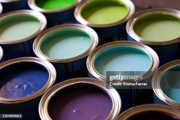 brightly coloured paint - ペンキ缶 ストックフォトと画像