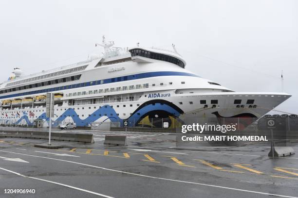 The German cruise ship Aida Aura is pictured on March 3, 2020 at the quay in Haugesund, Norway, pending the answer, whether two quarantineed...