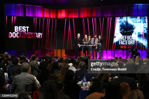 Steven Bognar, Julia Reichert, Julie Parker Benello, Jeff Reichert, and Lindsay Utz accept the Best Documentary Feature award for 'American Factory'...