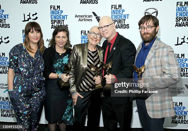 Julie Parker Benello, Lindsay Utz, Julia Reichert, Steven Bognar and Jeff Reichert pose in the press room with the Best Documentary Feature award for...