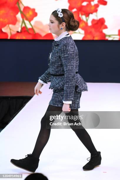 Model walks the runway wearing Bebe's and Liz's presents MODA Models during NYFW Powered By hiTechMODA on February 08, 2020 in New York City.