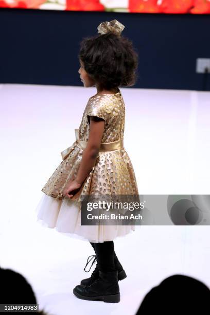 Model walks the runway wearing Bebe's and Liz's presents MODA Models during NYFW Powered By hiTechMODA on February 08, 2020 in New York City.