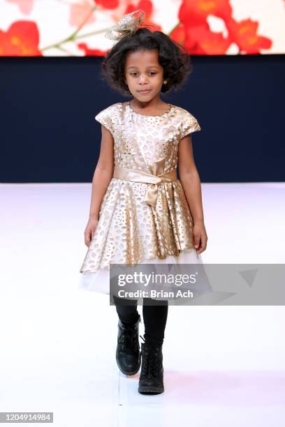 Model walks the runway wearing Bebe's and Liz's presents MODA Models during NYFW Powered By hiTechMODA on February 08, 2020 in New York City.