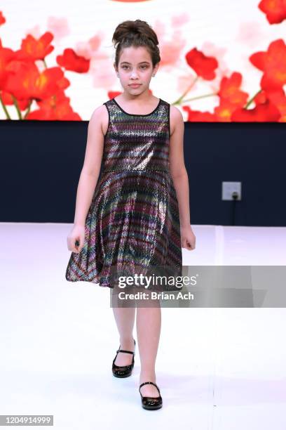 Model walks the runway wearing Bebe's and Liz's presents MODA Models during NYFW Powered By hiTechMODA on February 08, 2020 in New York City.