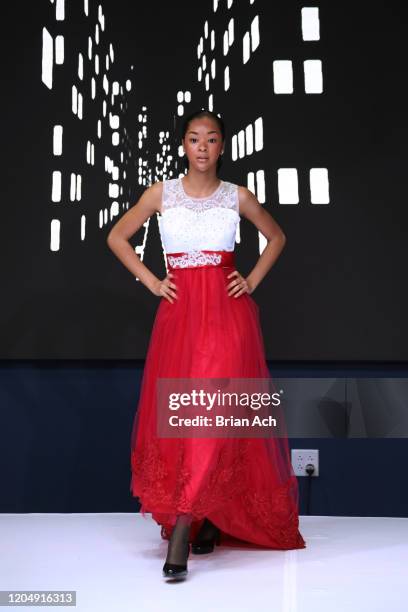 Model walks the runway wearing CHINO' ARTE' BY WAYNE during NYFW Powered By hiTechMODA on February 08, 2020 in New York City.