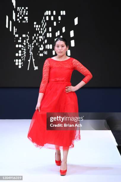 Model walks the runway wearing CHINO' ARTE' BY WAYNE during NYFW Powered By hiTechMODA on February 08, 2020 in New York City.