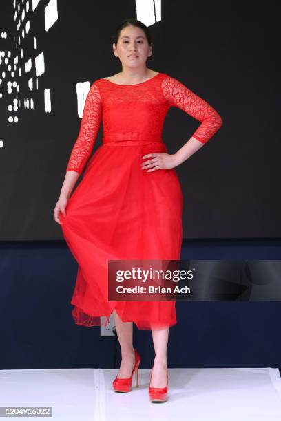 Model walks the runway wearing CHINO' ARTE' BY WAYNE during NYFW Powered By hiTechMODA on February 08, 2020 in New York City.