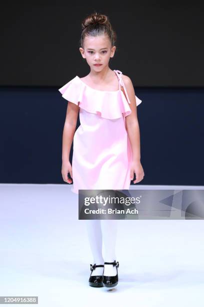 Model walks the runway wearing CHINO' ARTE' BY WAYNE during NYFW Powered By hiTechMODA on February 08, 2020 in New York City.