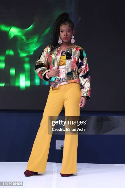 Model walks the runway wearing Yani Glam during NYFW Powered By hiTechMODA on February 08, 2020 in New York City.