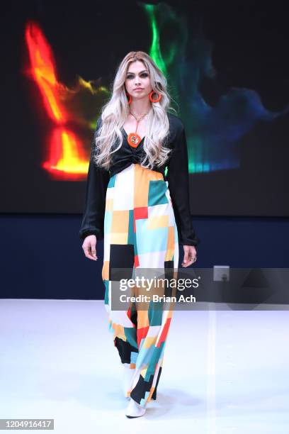 Model walks the runway wearing Yani Glam during NYFW Powered By hiTechMODA on February 08, 2020 in New York City.