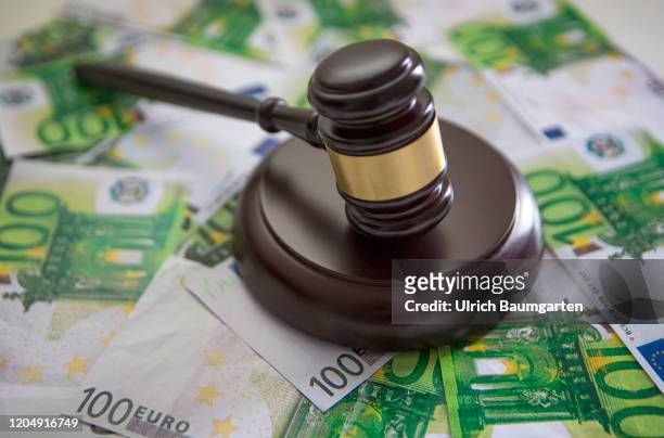 Symbol photo on the subjects auction hammer, court gavel, European Central Bank, case law, etc. The picture shows a judge gavel/auction hammer on...