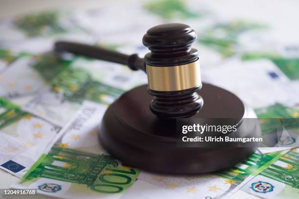 Symbol photo on the subjects auction hammer, court gavel, European Central Bank, case law, etc. The picture shows a judge gavel/auction hammer on...