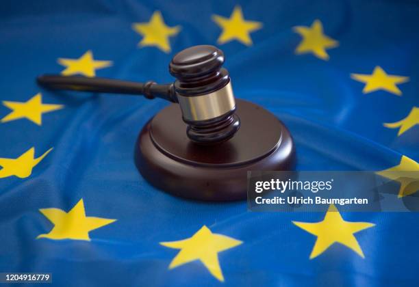 Symbol photo on the subjects auction hammer, court gavel, brexit, European Union, European Court of Justice, case law, etc. The photo shows a judge...