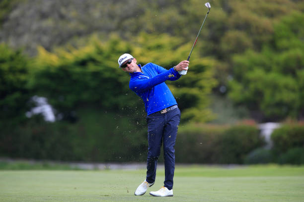 Lanto Griffin of the United States plays a shot on the 16th hole during the third round of the AT&T Pebble Beach Pro-Am at Pebble Beach Golf Links on...